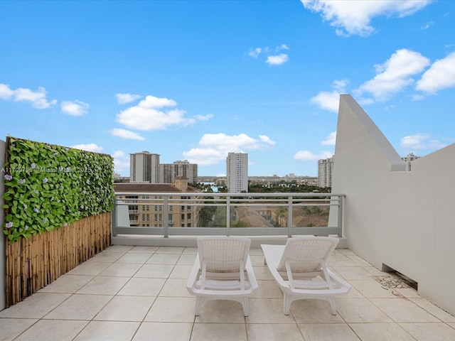 view of patio featuring a balcony