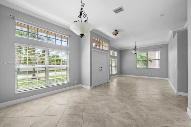 interior space featuring light tile patterned floors and crown molding