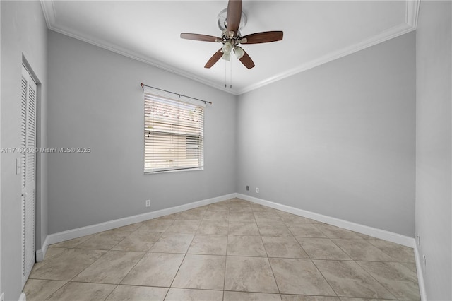 spare room featuring ceiling fan, crown molding, and light tile patterned flooring