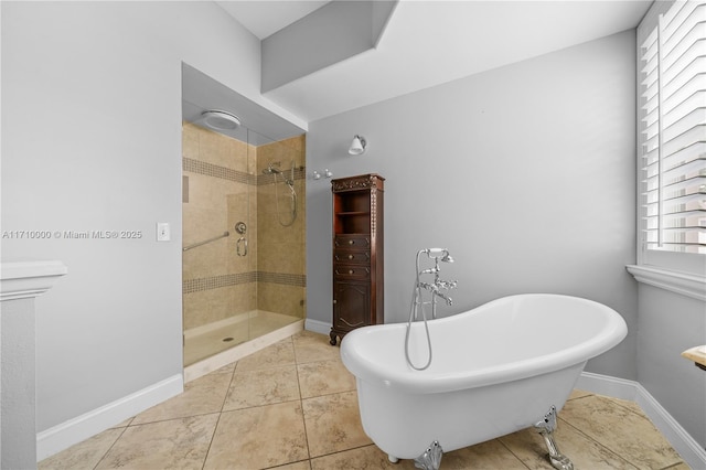 bathroom featuring shower with separate bathtub and tile patterned floors