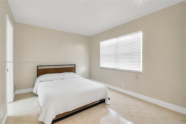 900 SW 125th Way Unit 304R, Pembroke Pines, FL 33027 - bedroom featuring light tile patterned floors