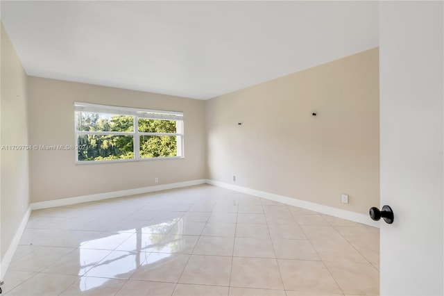 view of tiled spare room