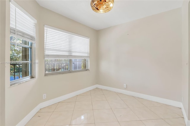 900 SW 125th Way Unit 304R, Pembroke Pines, FL 33027 - empty room with baseboards and light tile patterned floors