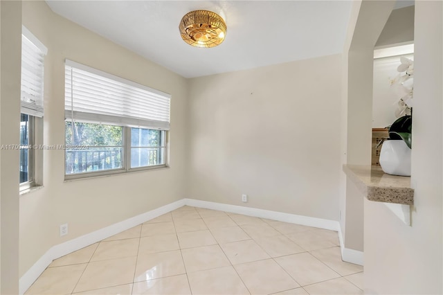 900 SW 125th Way Unit 304R, Pembroke Pines, FL 33027 - spare room featuring baseboards