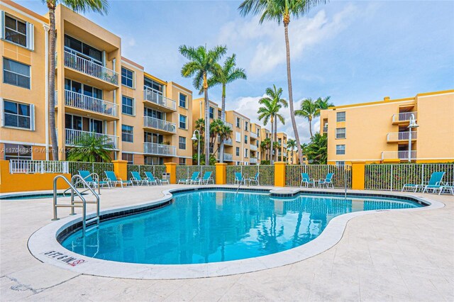 view of swimming pool featuring a patio