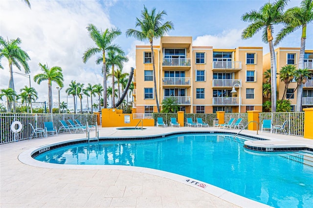 view of pool featuring a patio