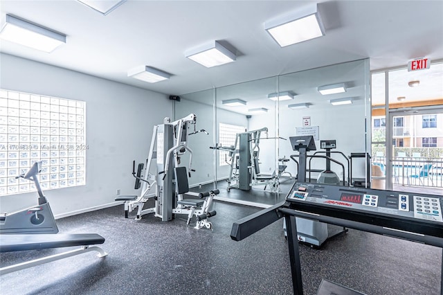 workout area featuring plenty of natural light