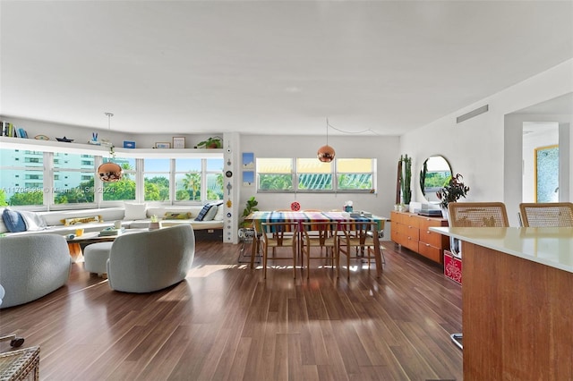 dining space featuring dark hardwood / wood-style floors