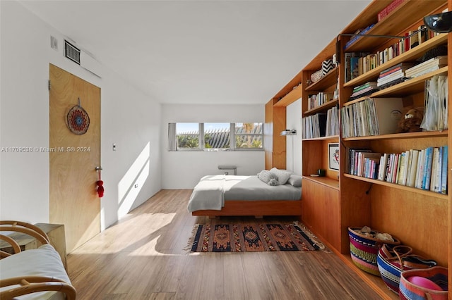 bedroom featuring light hardwood / wood-style flooring