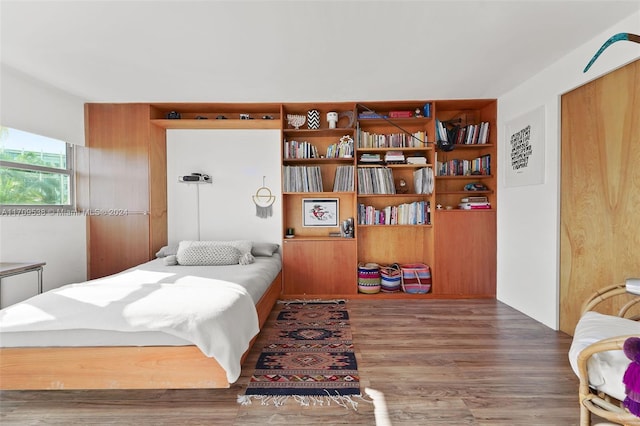 bedroom featuring hardwood / wood-style flooring