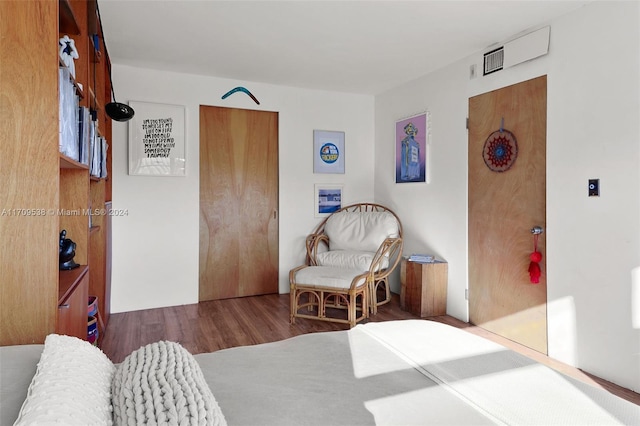 bedroom featuring dark hardwood / wood-style floors