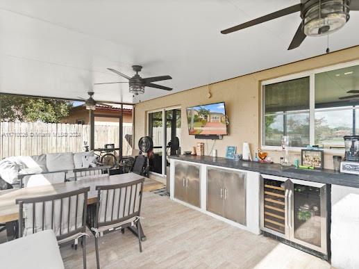 view of patio featuring wine cooler