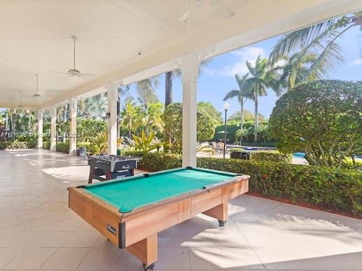 recreation room with ceiling fan and billiards