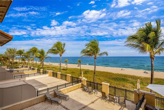 view of water feature with a beach view