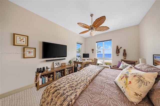 bedroom featuring ceiling fan and carpet floors