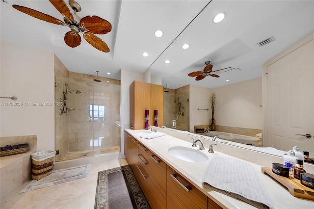 bathroom featuring shower with separate bathtub, vanity, and ceiling fan