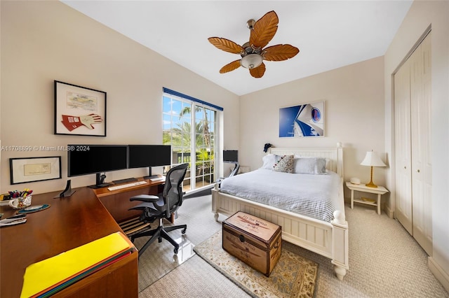 carpeted bedroom featuring ceiling fan and a closet