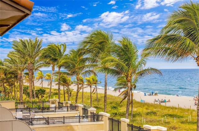 property view of water featuring a beach view