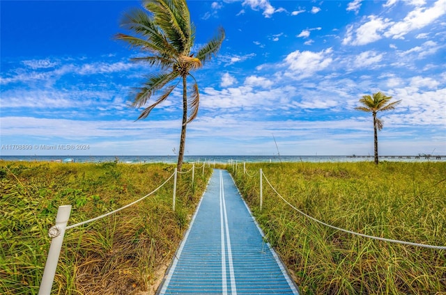 surrounding community with a water view