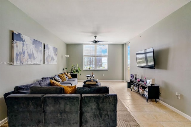 tiled living room featuring ceiling fan