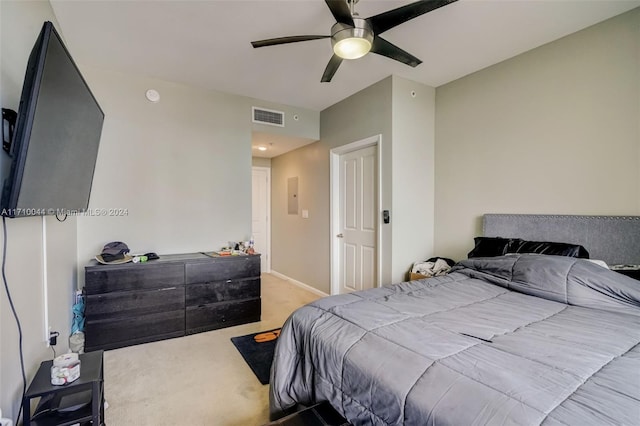 bedroom featuring ceiling fan and carpet floors