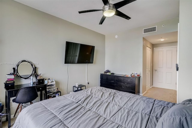 carpeted bedroom with ceiling fan