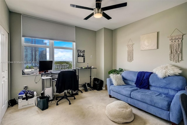 home office featuring carpet flooring and ceiling fan