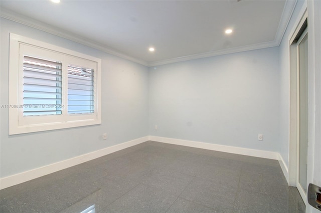 spare room with ornamental molding