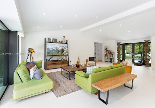 living room with french doors and lofted ceiling with beams