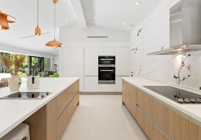 kitchen featuring white cabinets, pendant lighting, lofted ceiling with beams, and black electric stovetop