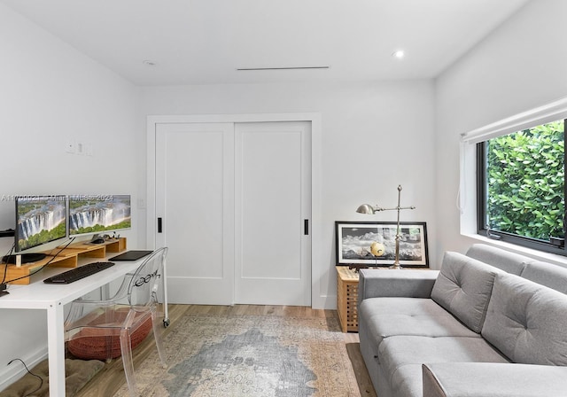 home office featuring hardwood / wood-style floors