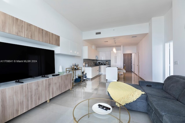 living room featuring sink