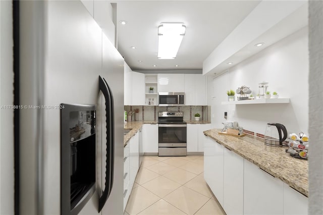 3901 S Ocean Dr Unit 15N, Hollywood, FL 33019 - kitchen featuring open shelves, stainless steel appliances, white cabinets, modern cabinets, and recessed lighting