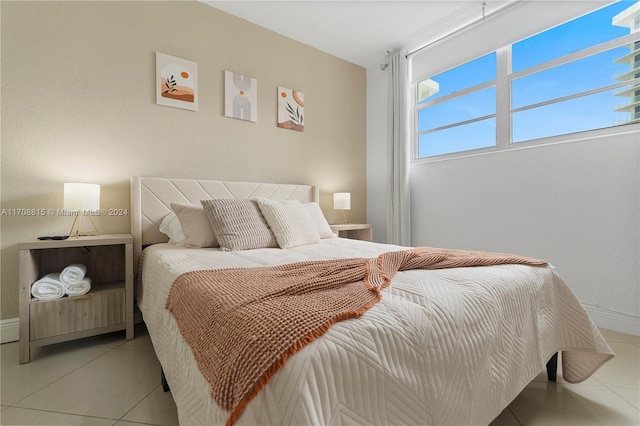 3901 S Ocean Dr Unit 15N, Hollywood, FL 33019 - bedroom featuring light tile patterned floors and baseboards