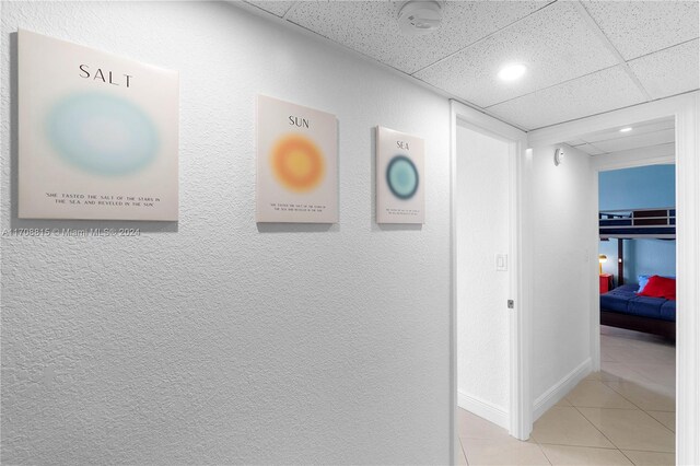 3901 S Ocean Dr Unit 15N, Hollywood, FL 33019 - hallway featuring light tile patterned floors, recessed lighting, and a drop ceiling
