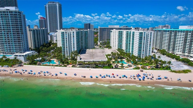 drone / aerial view with a view of the beach and a water view