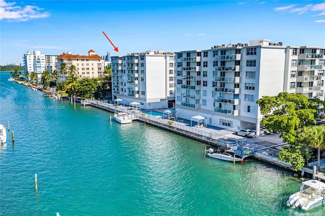 birds eye view of property featuring a water view