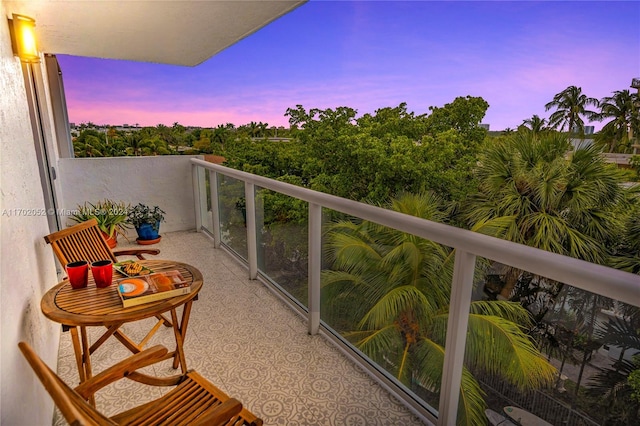 view of balcony at dusk