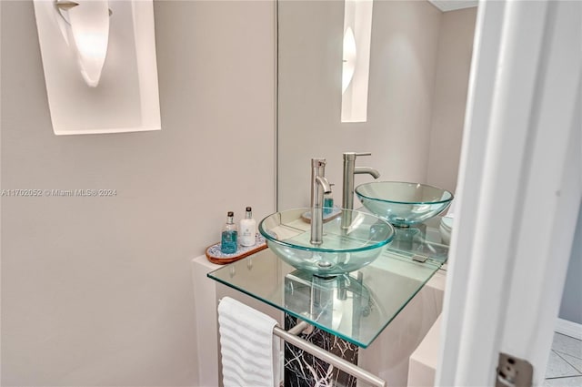 bathroom with vanity and tile patterned floors