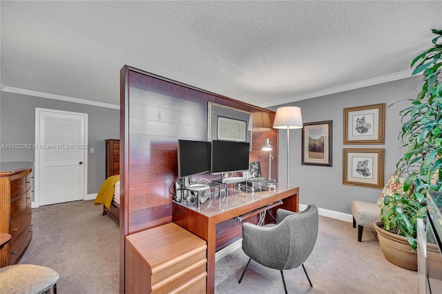 office space with light colored carpet, ornamental molding, a textured ceiling, and baseboards