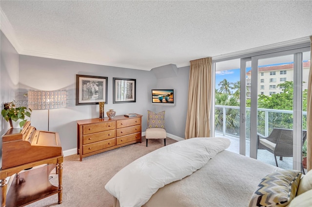 bedroom featuring access to exterior, light colored carpet, a textured ceiling, and ornamental molding