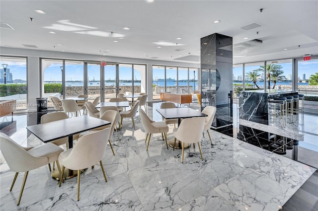 dining area with a water view