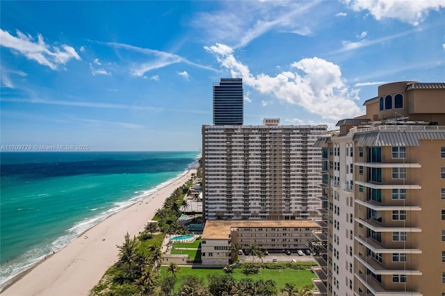 property view of water featuring a beach view