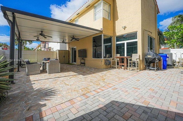 view of patio with ceiling fan