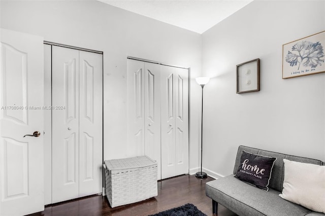 sitting room with dark hardwood / wood-style floors