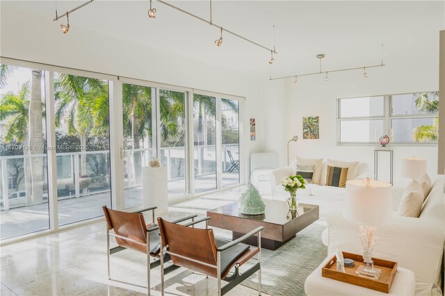6103 Aqua Ave Unit 301, Miami Beach, FL 33141 - living room featuring rail lighting