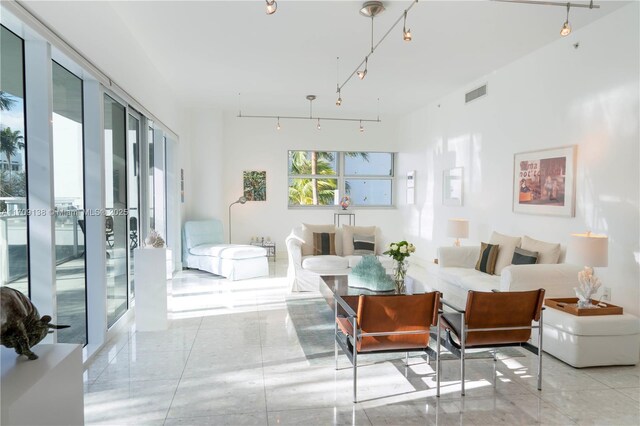 6103 Aqua Ave Unit 301, Miami Beach, FL 33141 - living area featuring rail lighting