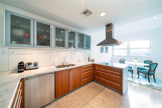 kitchen featuring dishwasher, sink, cooktop, light stone counters, and island exhaust hood