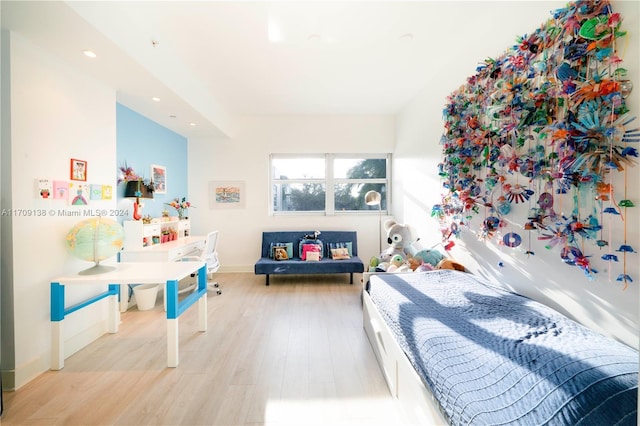 bedroom with light hardwood / wood-style flooring