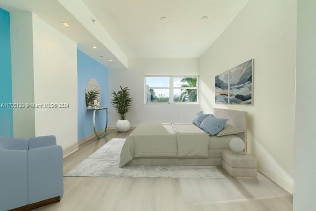 bedroom with light hardwood / wood-style floors